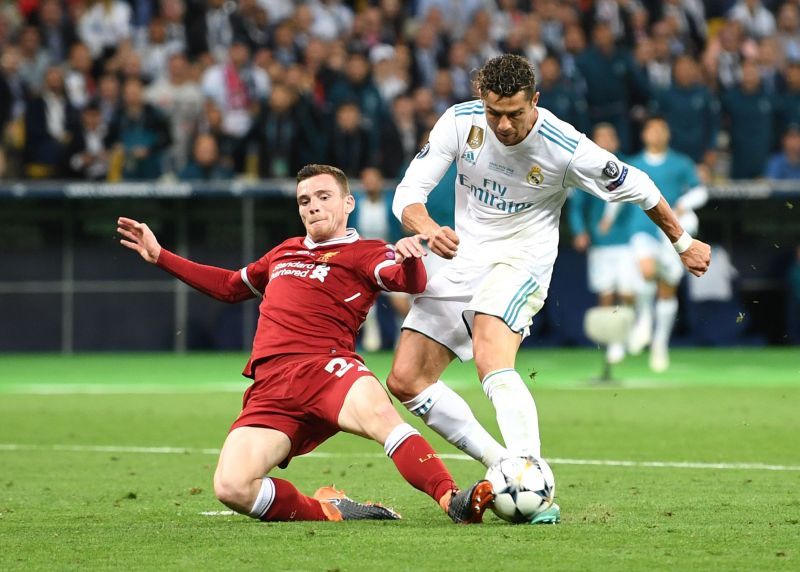 Andy Robertson (left) fights for the ball with Cristiano Ronaldo during the 2018 UEFA Champions League Final