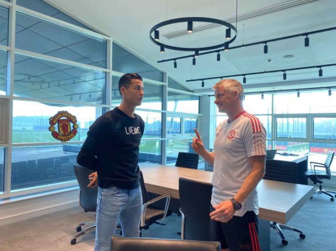 Cristiano Ronaldo (L) is back at Manchester United