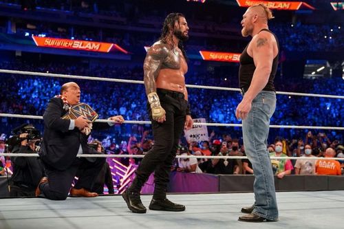 WWE Universal Champion Roman Reigns and Brock Lesnar standing toe-to-toe at SummerSlam 2021