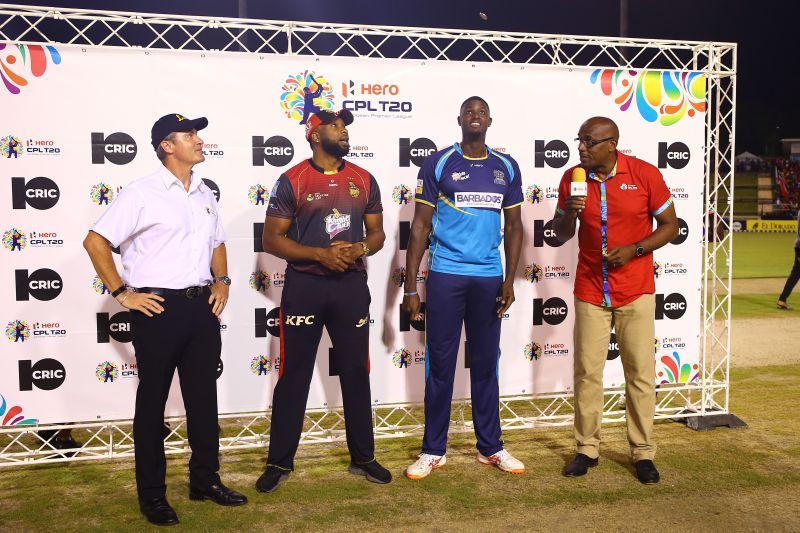 Kieron Pollard and Jason Holder. Getty Images