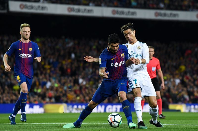 Luis Suarez (centre) and Cristiano Ronaldo (right) jointly won the Golden Boot.