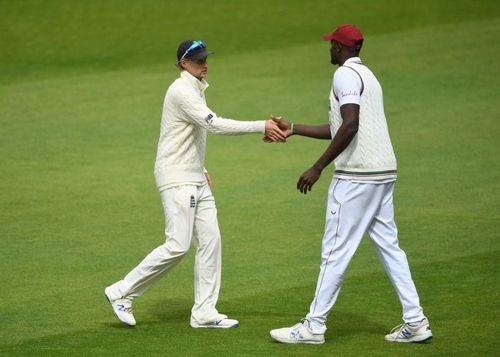 Joe Root and Jason Holder. (Image Credits: Twitter)