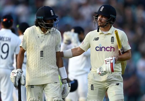 Haseeb Hameed (left) and Rory Burns of England leave the field at stumps on Day 4 at The Oval. Pic: Getty Images