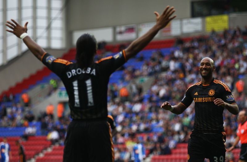 Chelsea celebrate during their 8-0 success over Wigan Athletic.