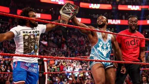 Kofi Kingston and Xavier Woods celebrating Big E's championship win