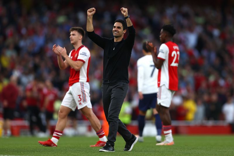 Arsenal celebrate their 3-1 victory over Tottenham Hotspur.