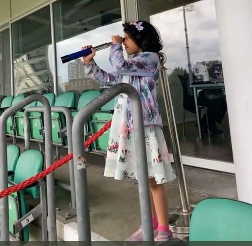 Ravichandran Ashwin's daughter takes a peak of the Kia Oval ahead of Day One.