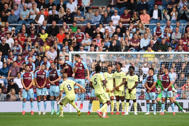 Martin Odegaard (#8) scores Arsenal&#039;s goal against Burnley from a free-kick.