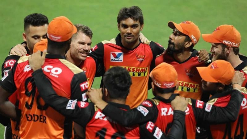 Sunrisers Hyderabad players in a group huddle.