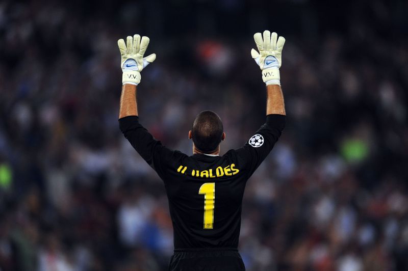 Victor Valdes celebrates a goal for Barcelona