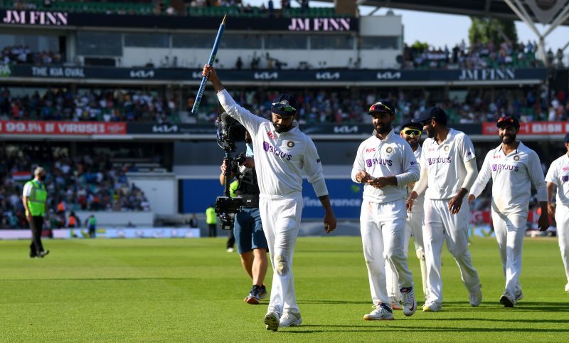 The Indian team celebrate a famous victory at the Kennington Oval.