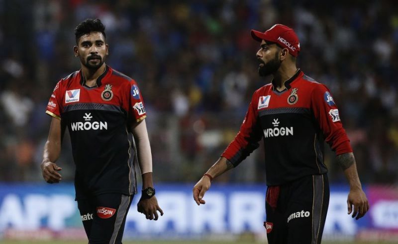 Mohammed Siraj and Virat Kohli of RCB