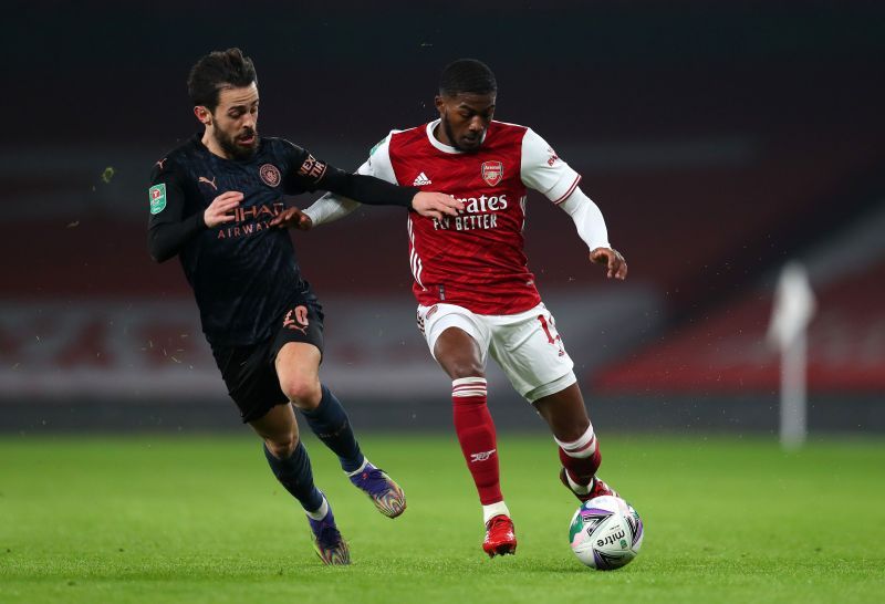 Ainsley Maitland-Niles (right) is one of several Premier League players who should have left this summer.