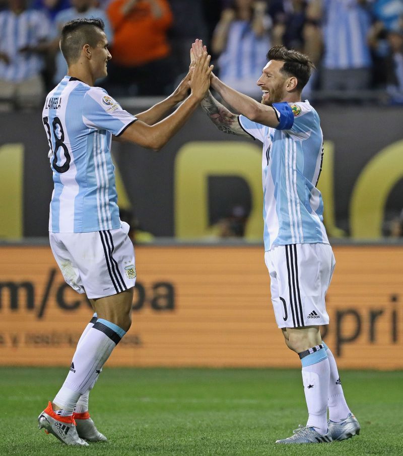 Erik Lamela and Lionel Messi share the Argentina dressing room