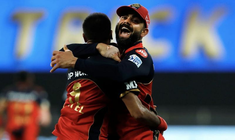 Virat Kohli celebrates with Harshal Patel after the latter completed his hat-trick. (Photo: BCCI)