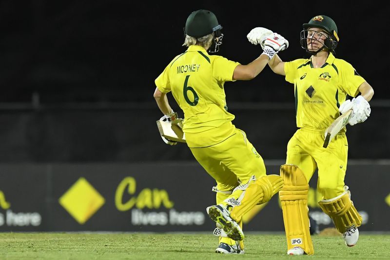 Australia batters Beth Mooney and Nicola Carey celebrate after sealing a thrilling win in the 2nd ODI vs India Women.
