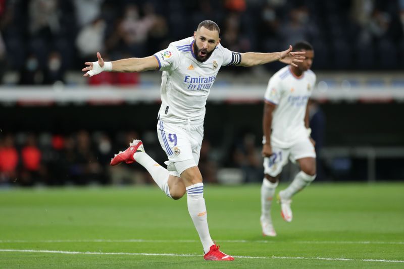 Karim Benzema celebrates after scoring a goal.