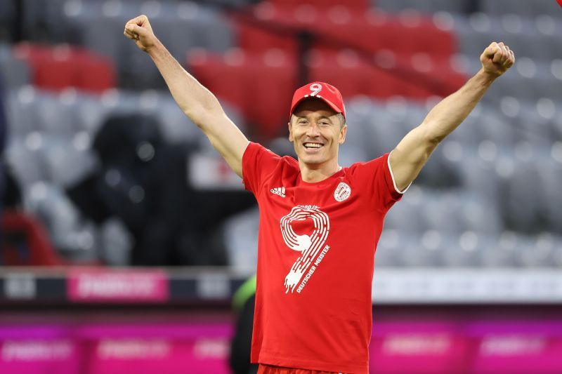 Robert Lewandowski celebrates after securing the Bundesliga title for Bayern Munich