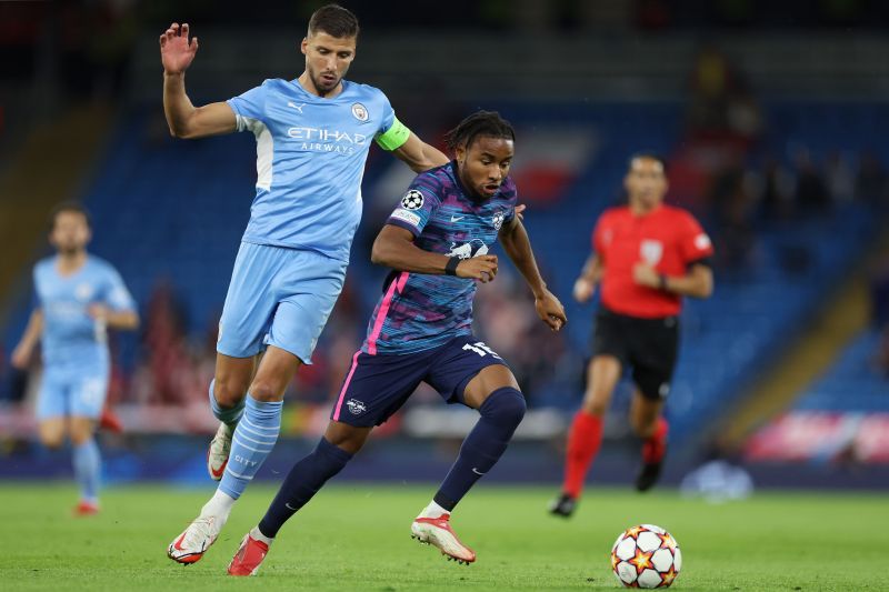 Christopher Nkunku (right) scored a hat-trick for RB Leipzig against Manchester City