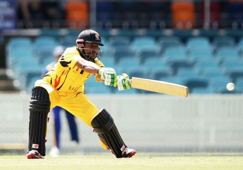 Assad Vala of Papua New Guinea playing a shot.