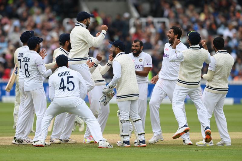 Virat Kohli (jumping) celebrates a wicket with teammates at Lord&#039;s. Pic: Getty Images