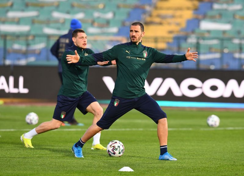 Leonardo Bonucci warms up for Italy ahead of a match