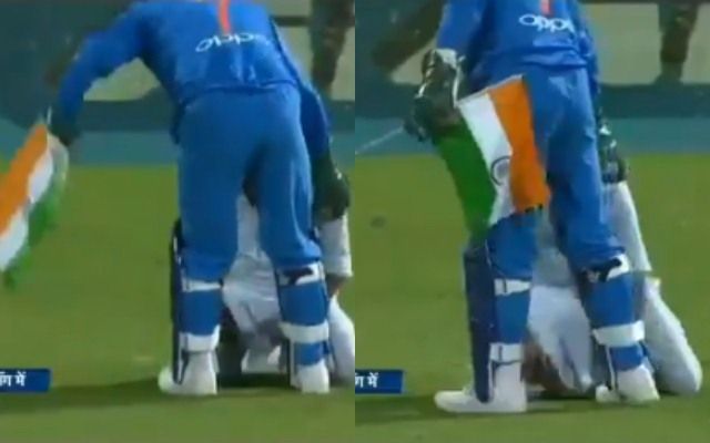 MS Dhoni prevents the Indian flag from touching the ground