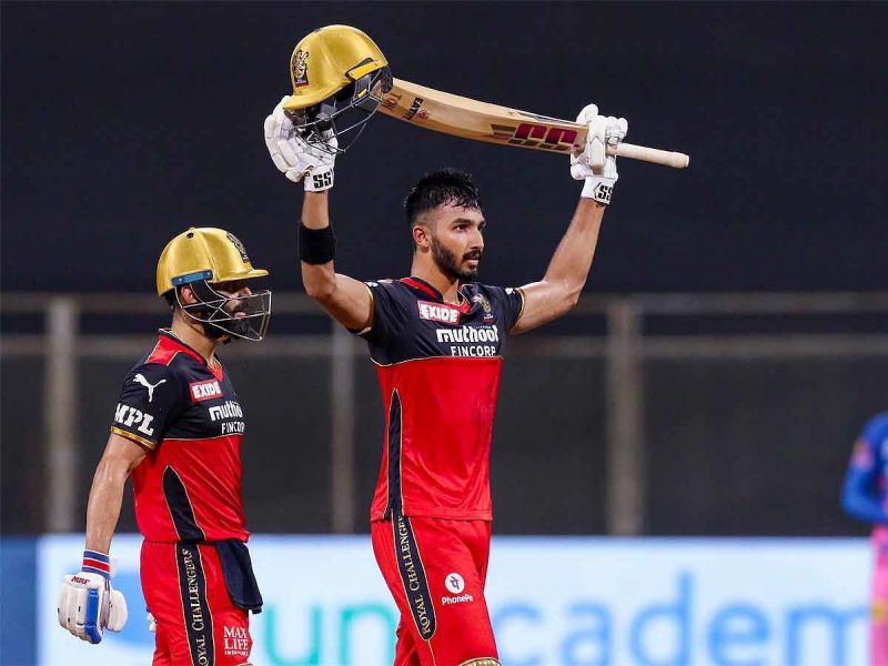 Devdutt Padikkal (R) with RCB skipper Virat Kohli during first half of IPL 2021 in India.