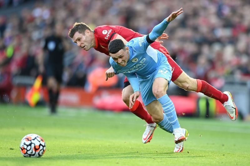 Manchester City get the better of James Milner.