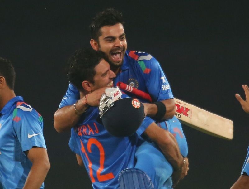 Virat Kohli and Yuvraj Singh celebrate India&#039;s win over South Africa in the 2014 T20 World Cup.
