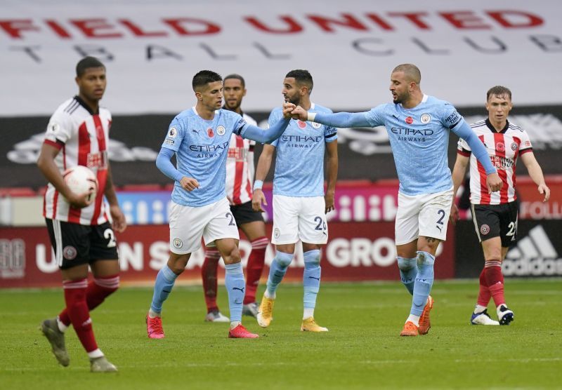 Joao Cancelo (Second from Left) and Kyle Walker (Second from Right) in the Premier League