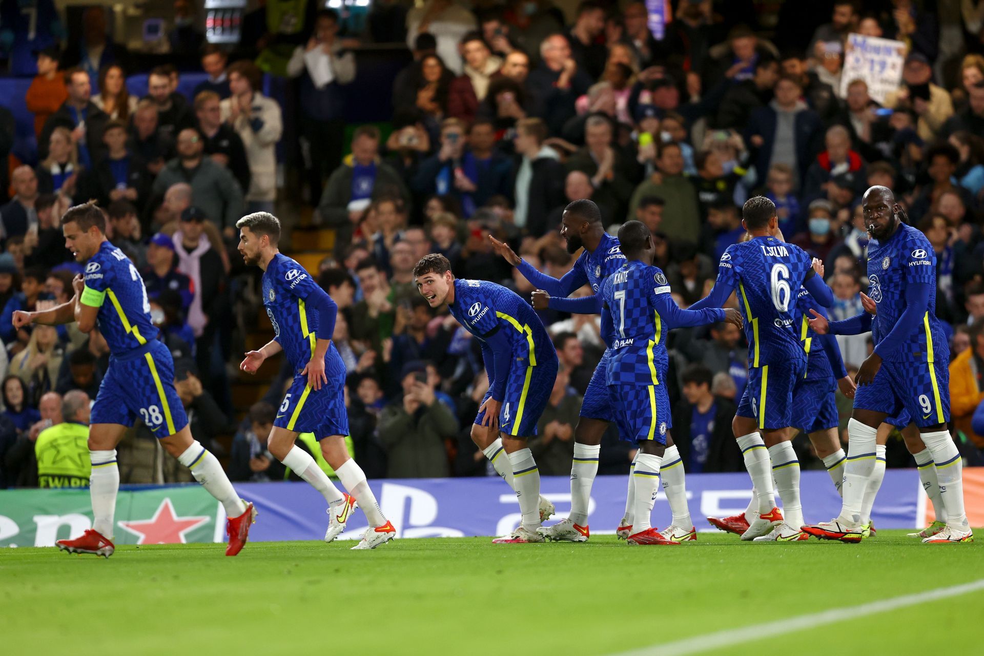 Andreas Christensen celebrates with teammates after scoring the team's first goal of the night.