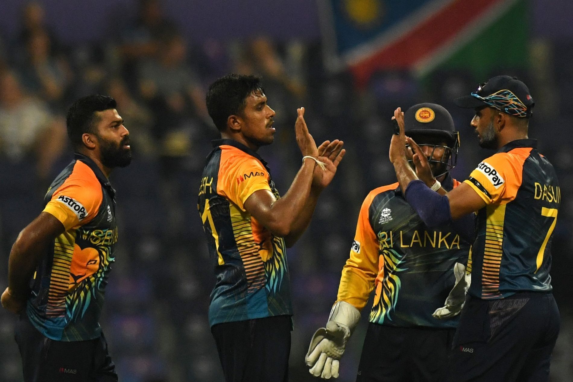 Sri Lankan cricketers celebrate a wicket. Pic: T20WorldCup/ Twitter