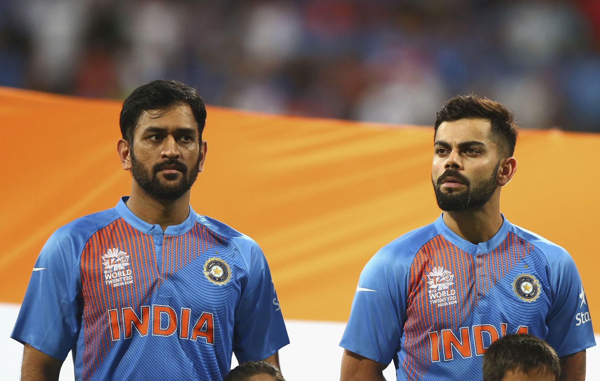 Virat Kohli and MS Dhoni look on at the 2016 T20 World Cup.