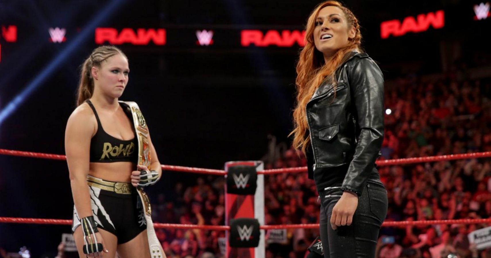 Becky Lynch and Ronda Rousey trading words on WWE RAW