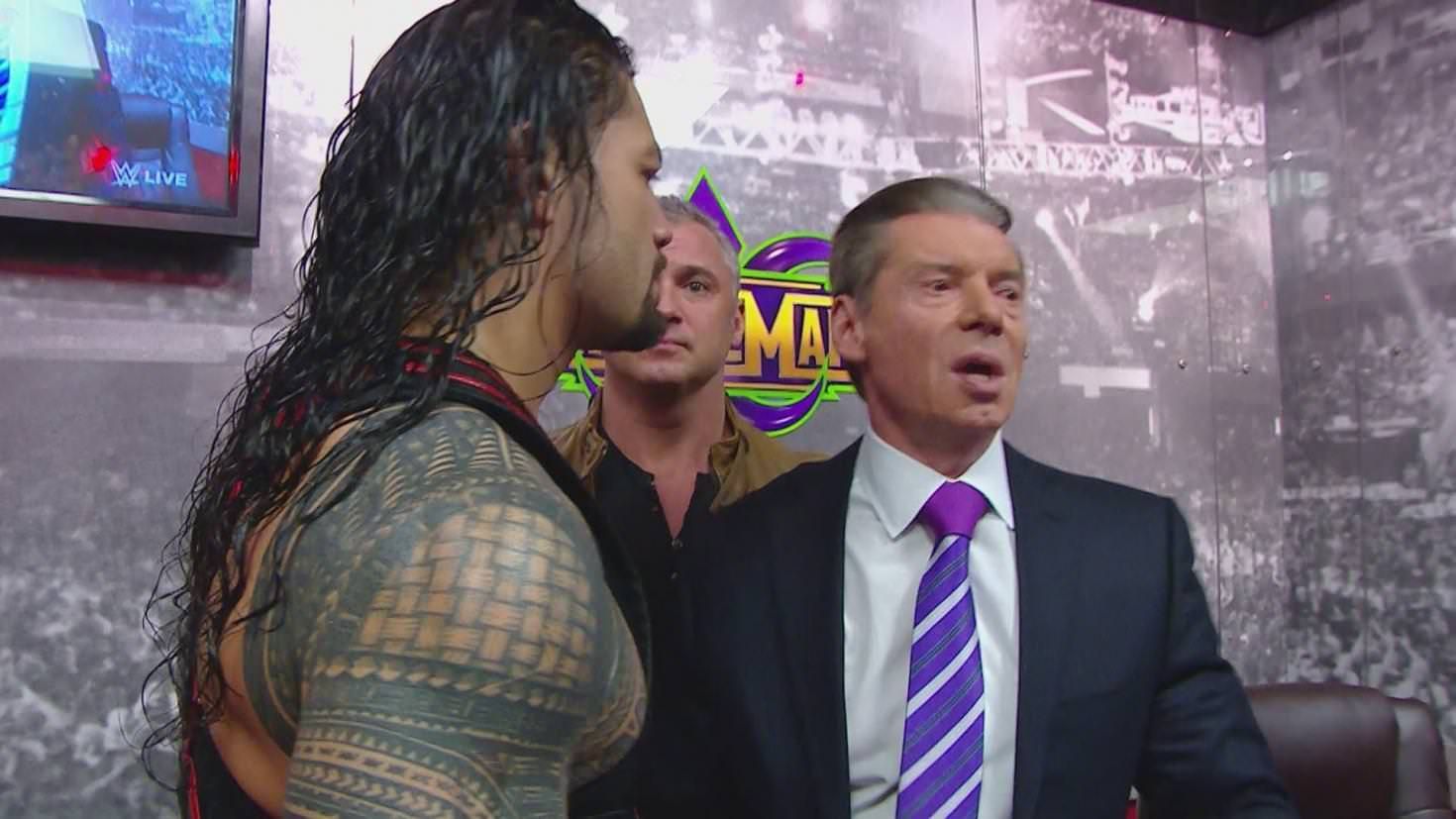 Roman Reigns and Vince McMahon backstage