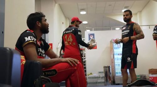 Srikar Bharat interacts with Virat Kohli. Pic: IPLT20.COM