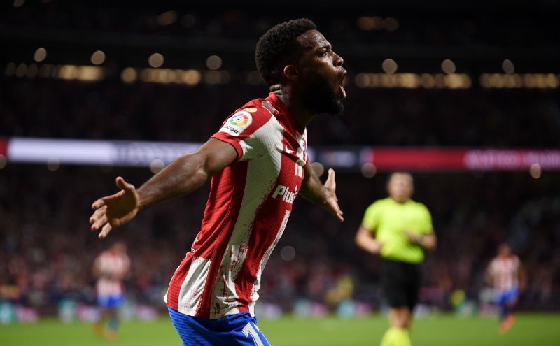 Atletico Madrid&#039;s Thomas Lemar celebrates after scoring against Barcelona.