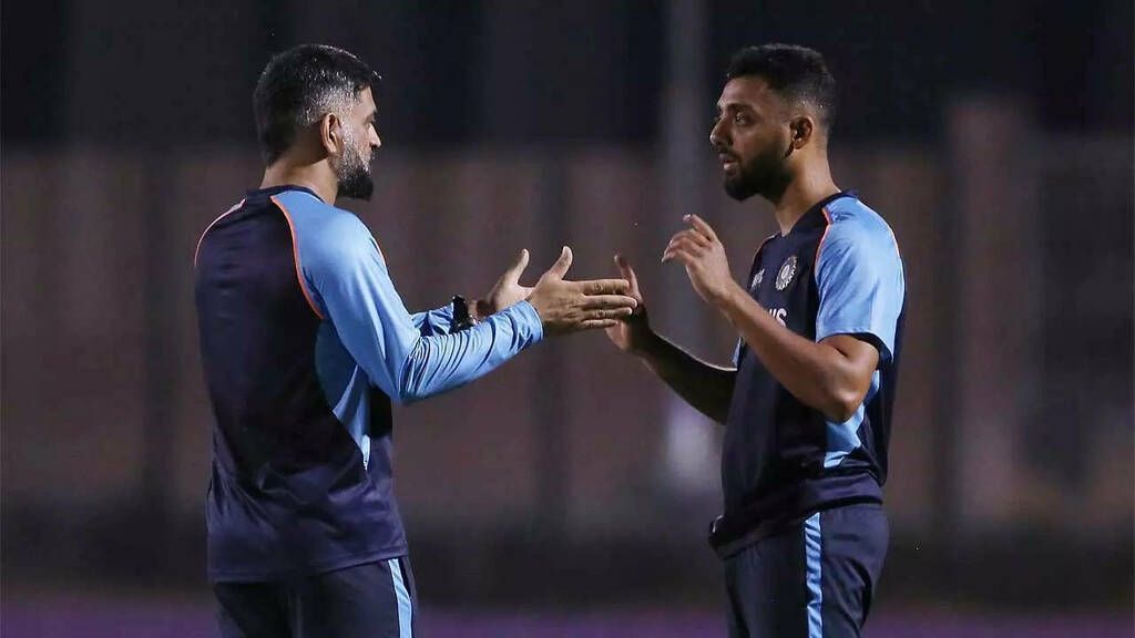 Varun Chakravarthy (right) with MS Dhoni. Pic: BCCI