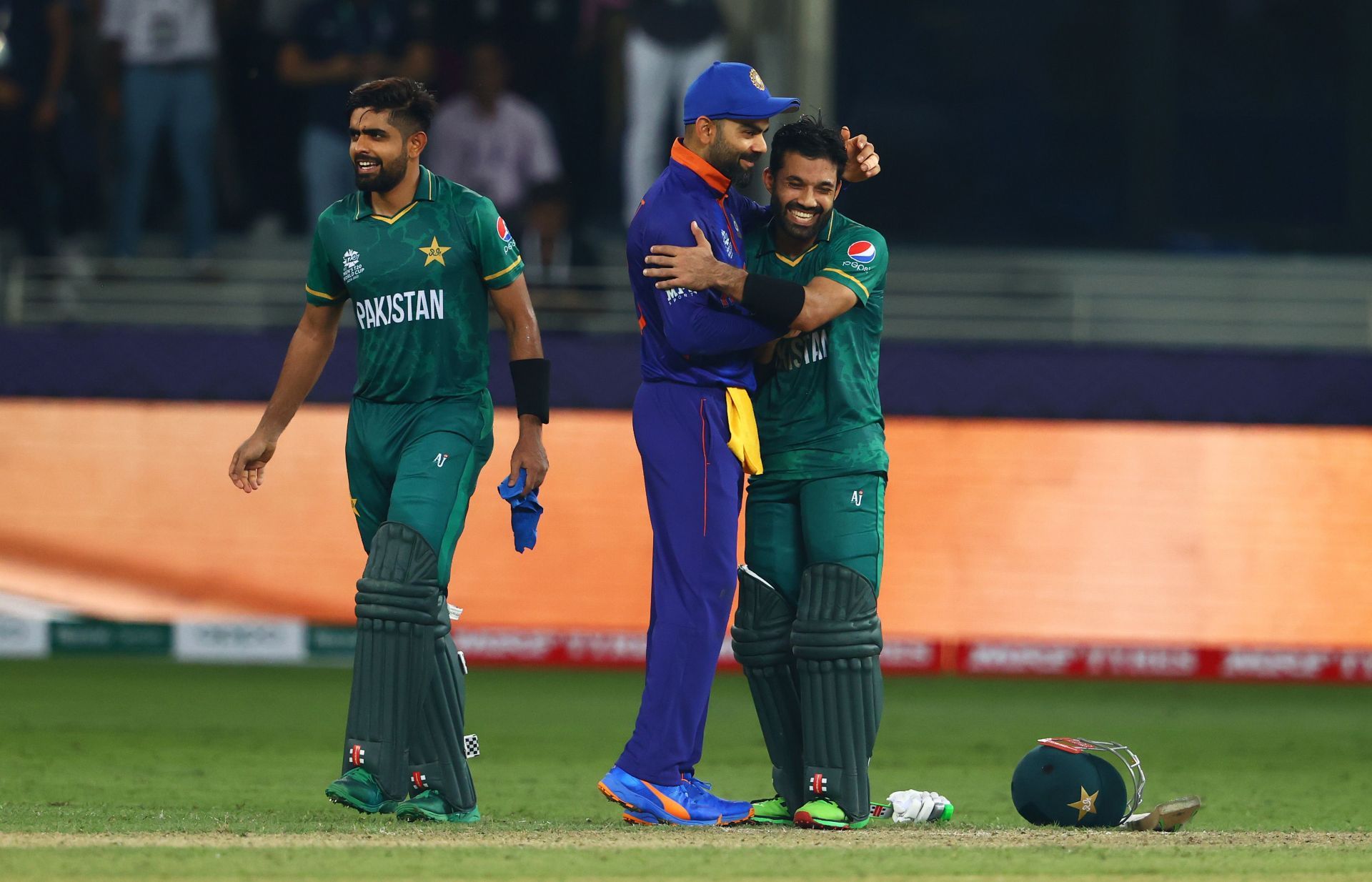 Mohammad Rizwan and Babar Azam interact with Virat Kohli. Pic: Getty Images