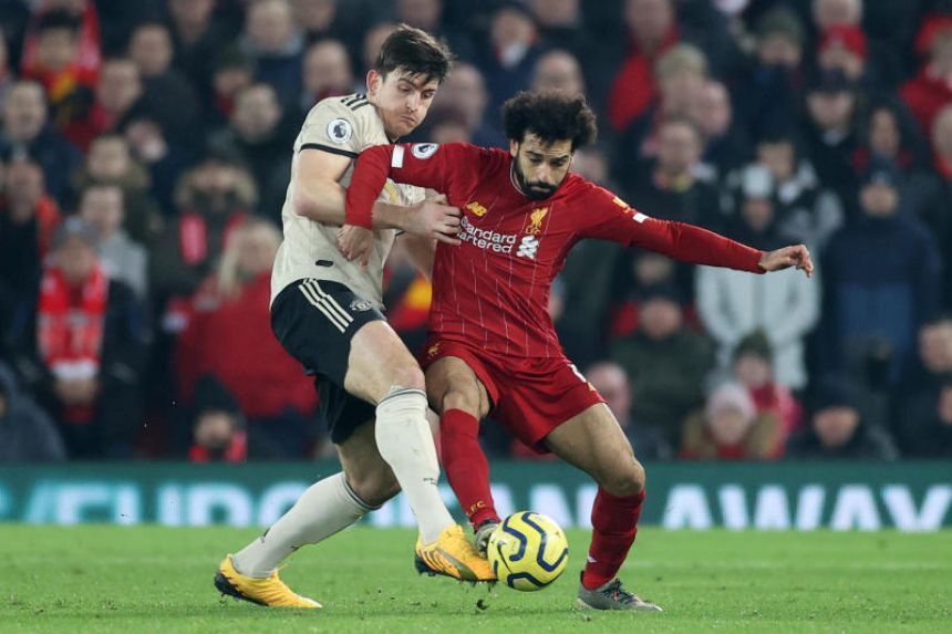 Salah (left) could provide a big test of Maguire&#039;s defensive mettle/