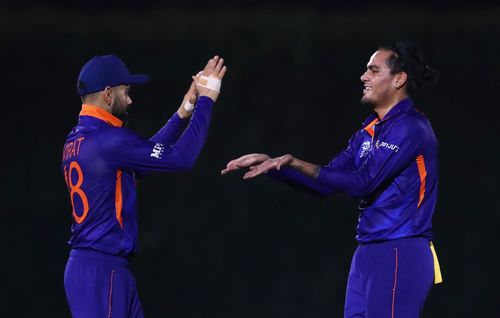 Virat Kohli and Rahul Chahar during the T20 World Cup 2021 warm-up game against England. Pic: BCCI/ Twitter