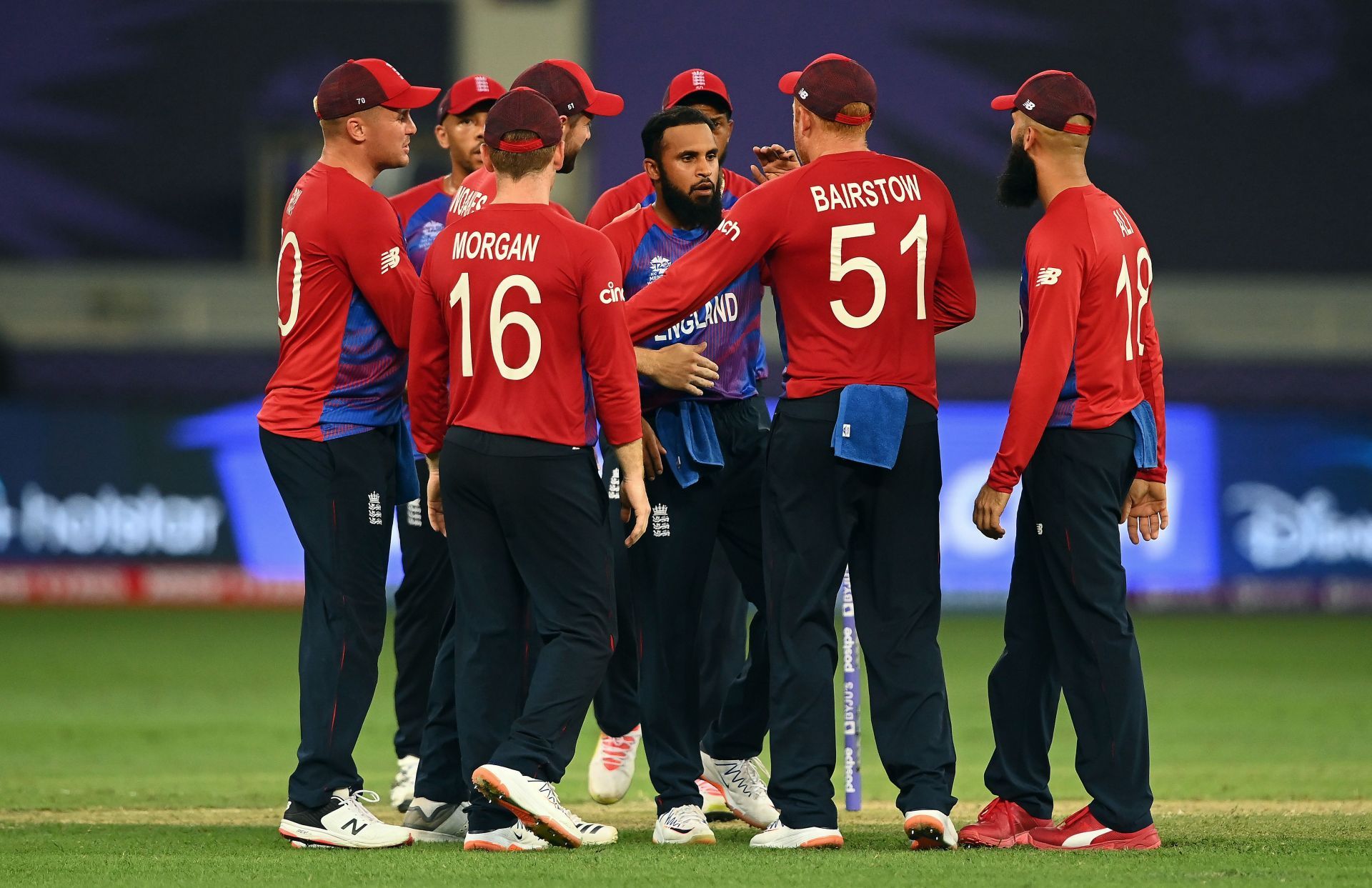 English team celebrating the fall of a wicket against West Indies