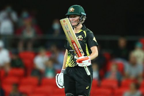 Beth Mooney celebrates her half-century against India women in the 3rd T20I.