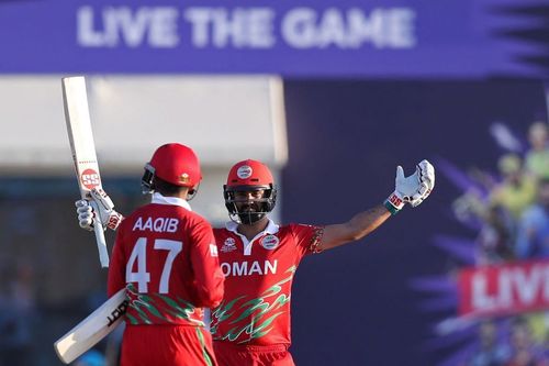 Jatinder Singh celebrates Oman's victory with Aaqib Ilyas (Image Courtesy: Twitter)