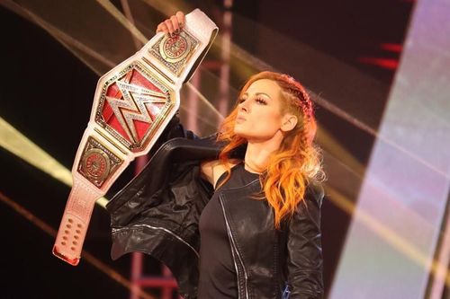 Becky Lynch holding up the RAW Women's Title