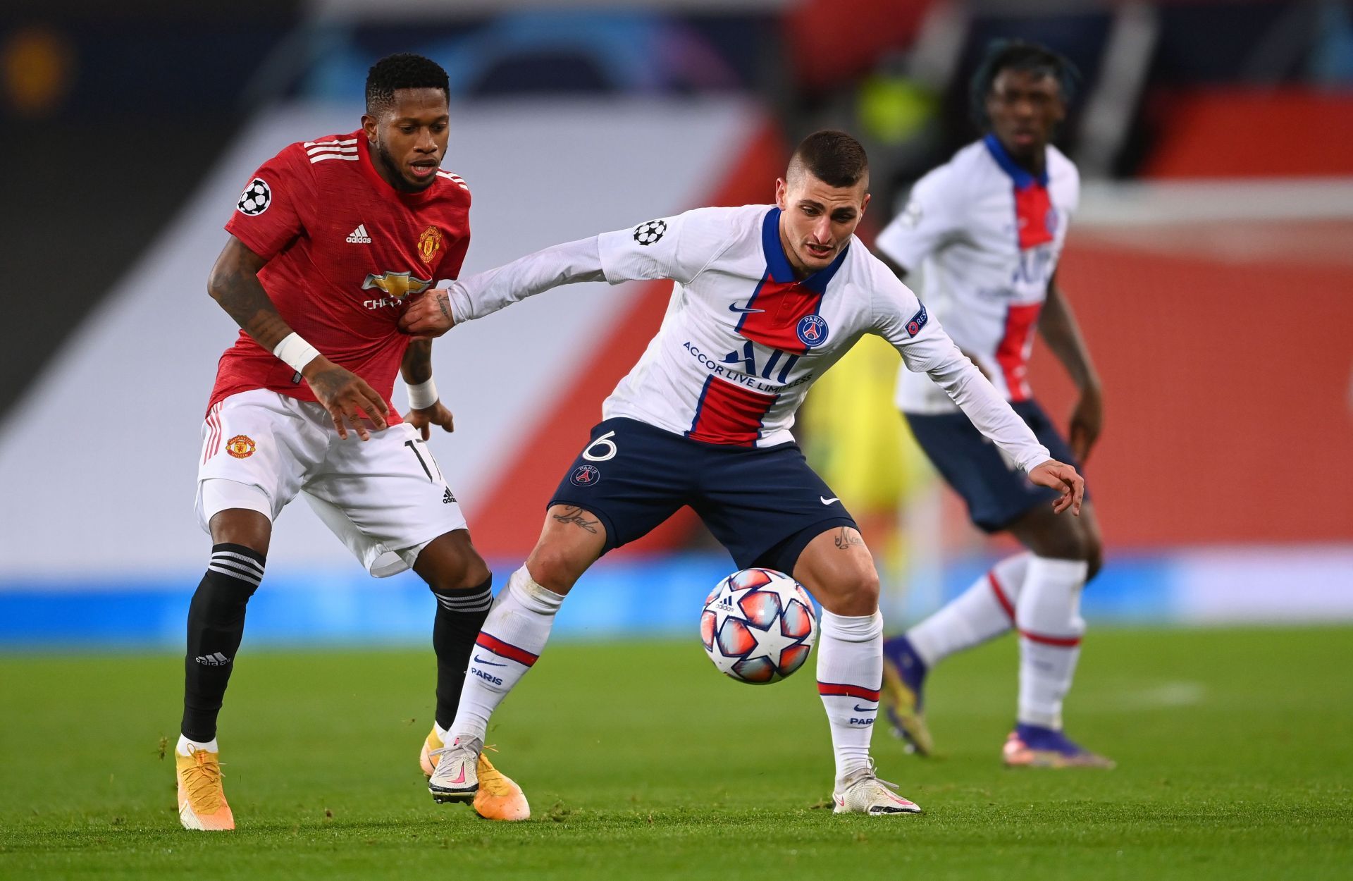 PSG&#039;s Marco Verratti (#6) battles Manchester United&#039;s Fred (L)