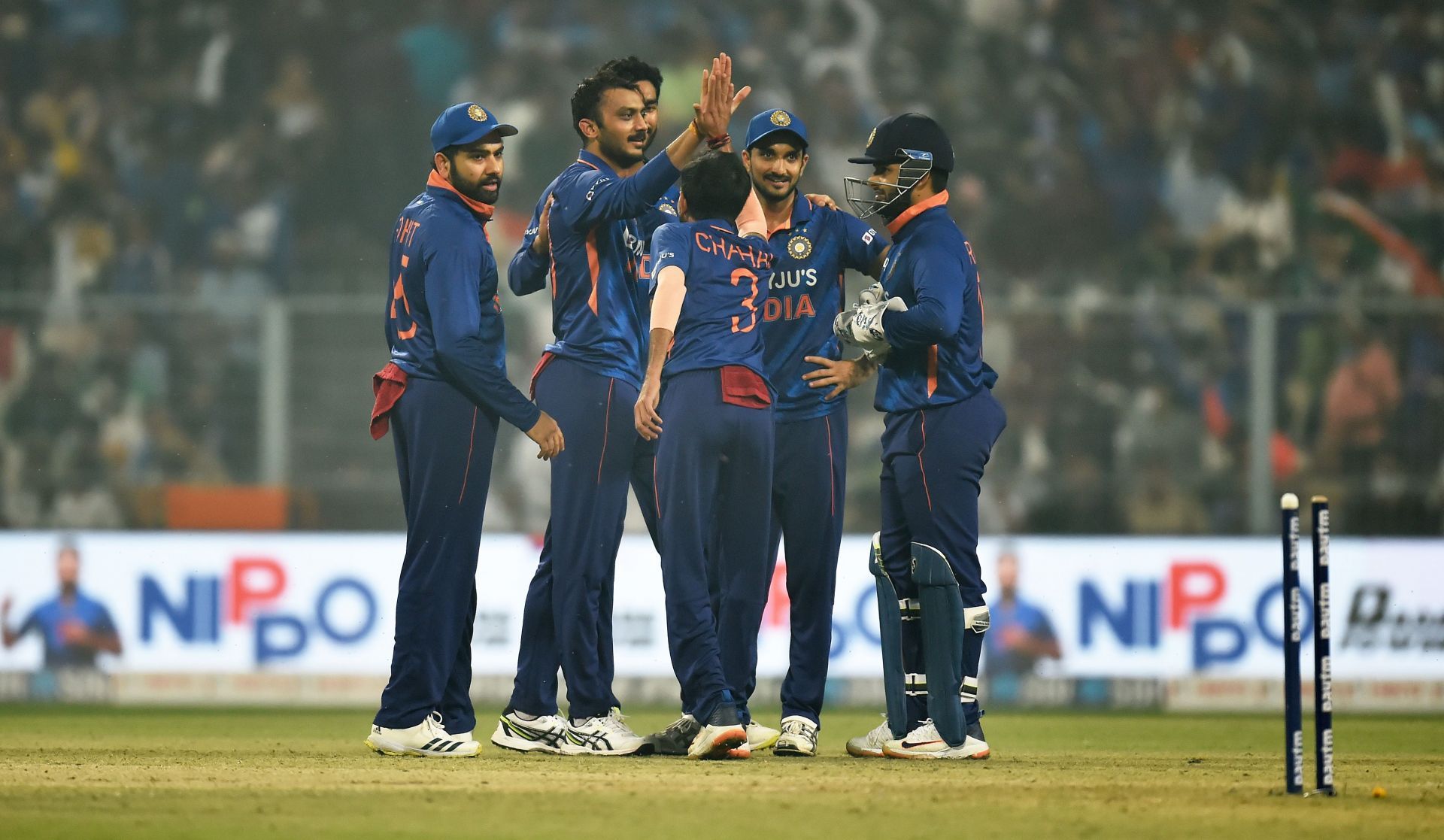 Axar Patel celebrates the wicket of Glenn Phillips with teammates. Pic: Getty Images