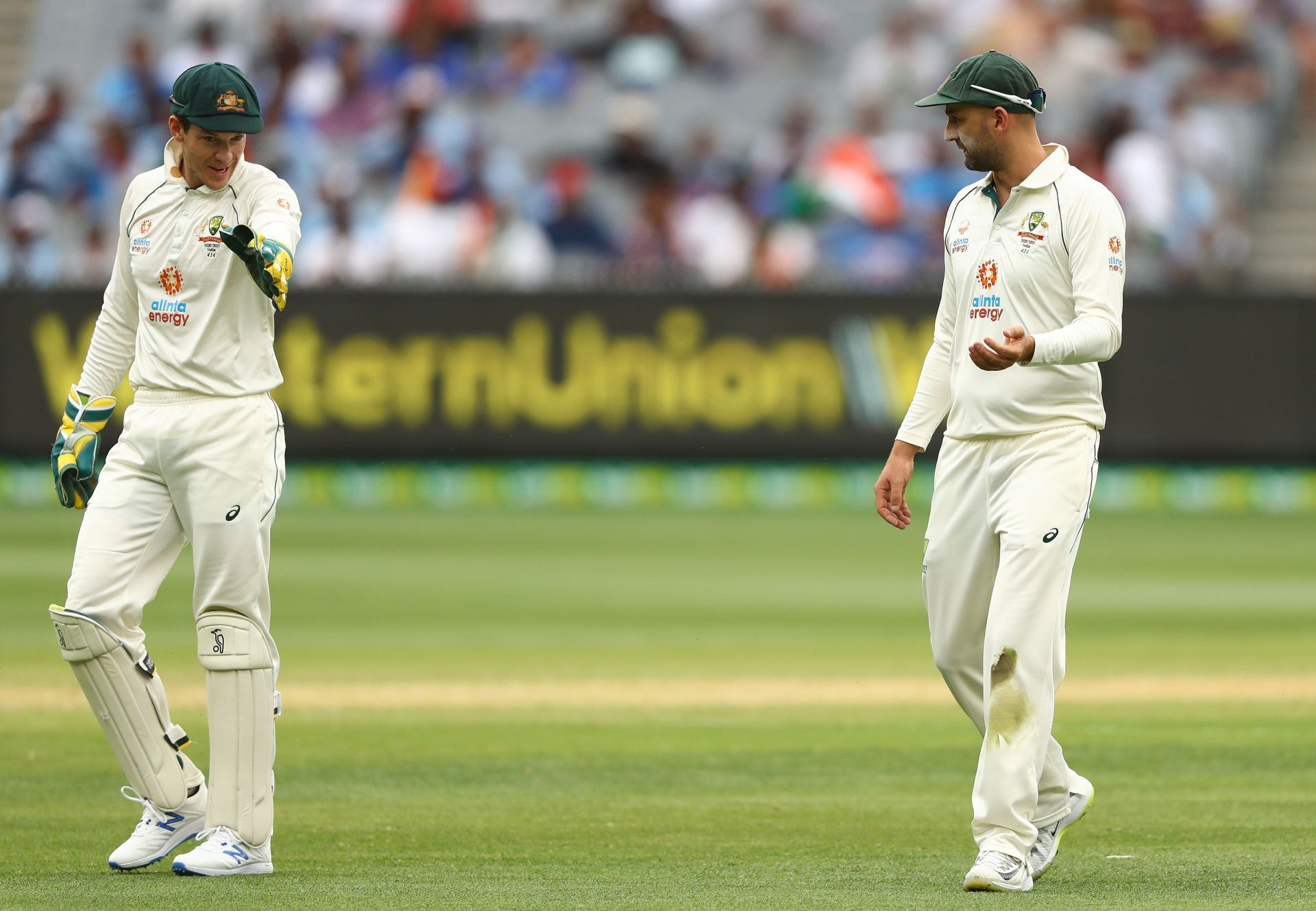 Tim Paine (L) and Nathan Lyon. (Image source: Getty)