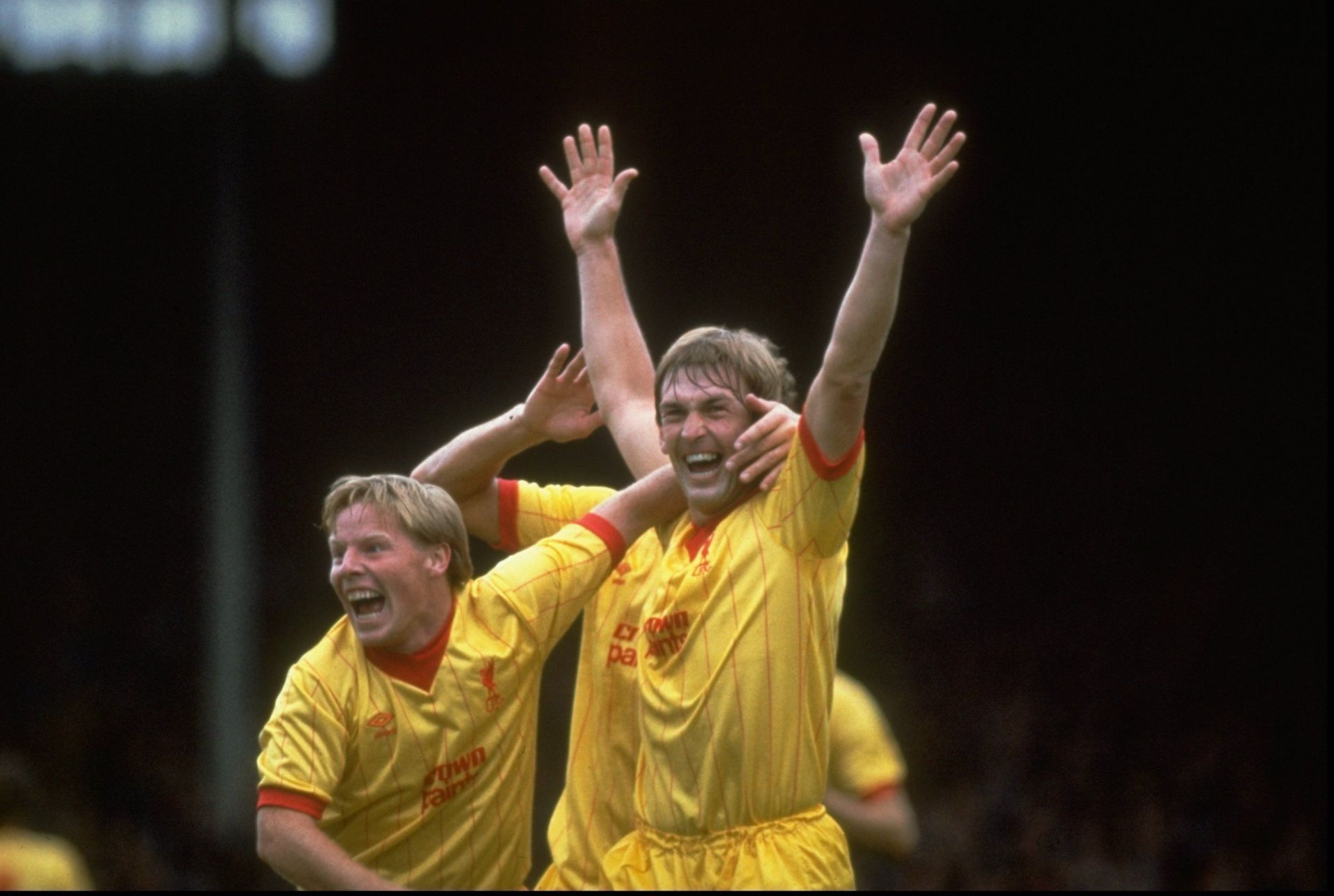 Sammy Lee and Kenny Dalglish (R) of Liverpool
